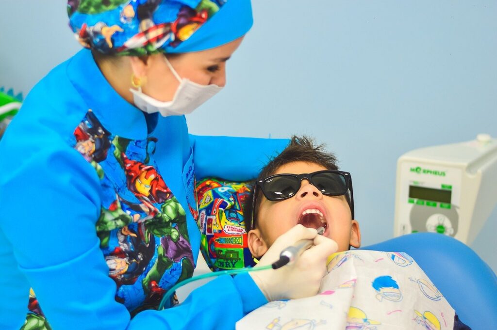 Dentist with a child patient