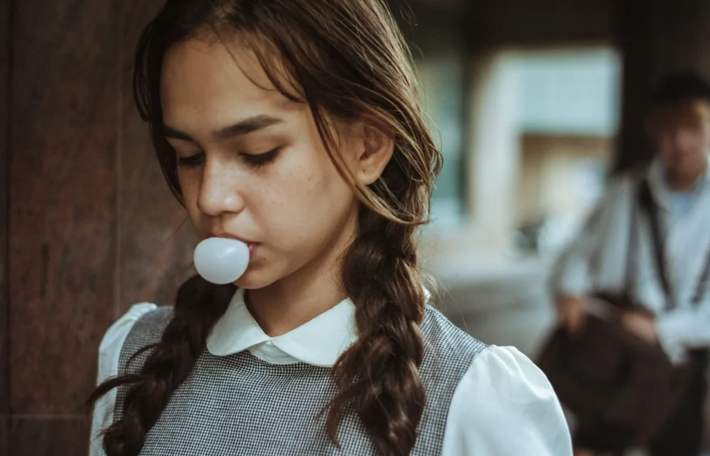Girl chewing sugar-free gum